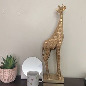 Golden giraffe figurine